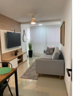 Apto suite com piscina e vista lateral incrível para o mar